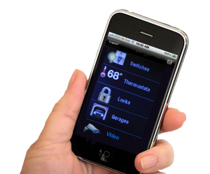 Hand holding cell phone with Total Connect app